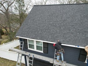 Mighty Dog Roofing - Photo -1