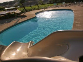 Benchmark Fiberglass Pools & Spas - Photo 0