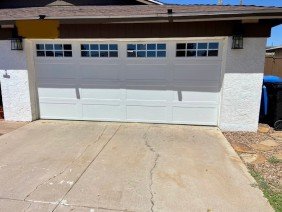 Smokey's Garage Door - Photo -1